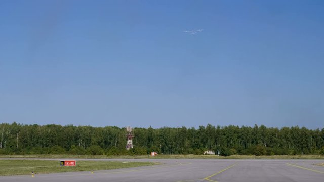 Acrobatic team piloting on the background of blue sky and leaving a condensation trail. 4K