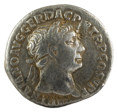 Ancient Roman silver denarius coin of Emperor Trajan. Obverse.