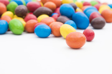 sweets of vibrant colors isolated in white background