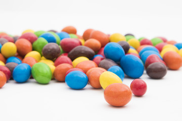 sweets of vibrant colors isolated in white background