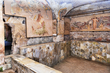 Fototapeta na wymiar The basin of the frigidarium inside the Seven Wise Men's spas in the archaeological excavations of Ancient Ostia - Rome