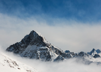 clouds at the foot of the mountain