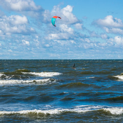 Kiteboarding. Extreme Sport Kitesurfing. Sea, clouds and kitesurfing.