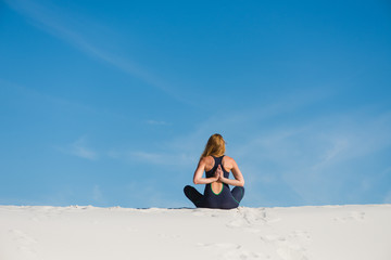 Woman make meditation and namaste from back