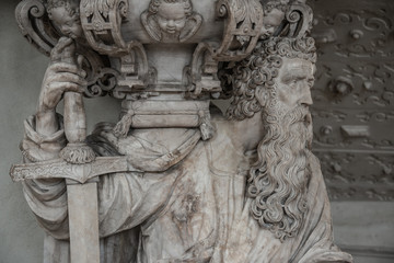 Statue of old bearded Knight with sword in Magdeburg Cathedral