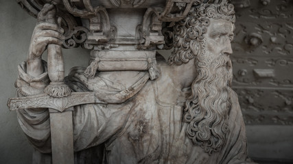 Statue of old bearded Knight with sword in Magdeburg Cathedral