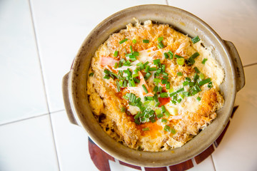 Japanese soup with deep fried pork and egg, serve on hot ceramic bowl. image for background, wallpaper, menu list and copy space.