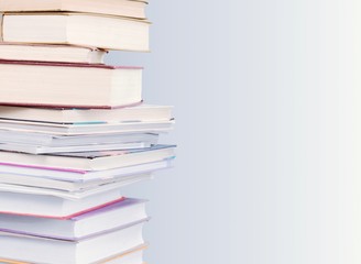 Stack of colorful books on table