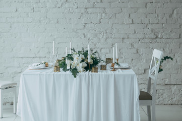 wedding decor, flowers, black and gold decor, candles.
