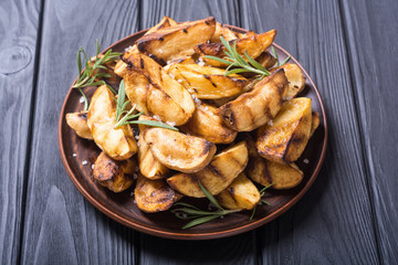 Homemade grilled potatoes with rosemary