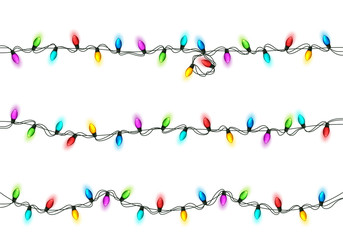 Christmas Festive Lights. Decorative Glowing Garland Isolated on White Background. Shiny Colorful Decoration for Christmas and New Year Holidays.