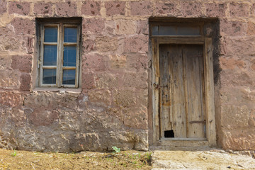 Fototapeta na wymiar Old building with window in the village Shirak Province, Armenia.
