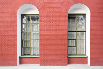 Brick wall with two windows