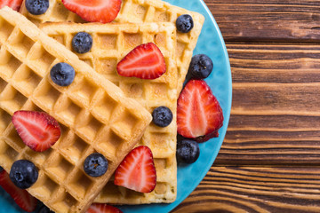 Belgian waffles with strawberry and blueberry