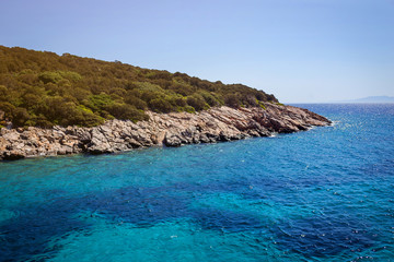 Turquoise water near beach on Aegean coast  sea Turkish resort, Bodrum, Turkey