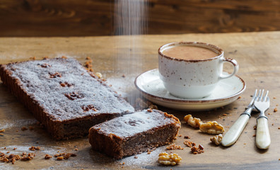 walnut frangipane tart with a cup of coffee