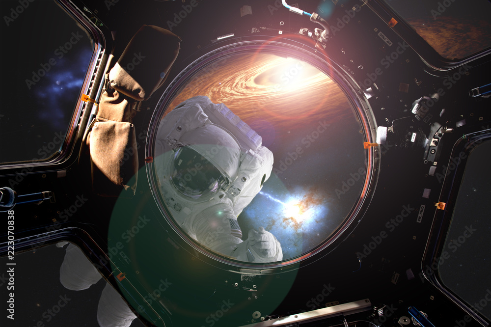 Canvas Prints view through the space ship illuminator of astronaut in open spacce with flare frome the star (image