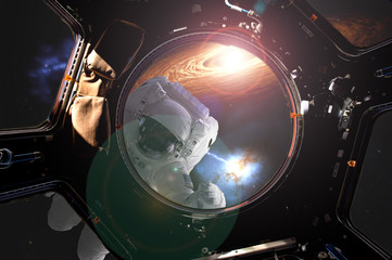 view through the space ship illuminator of astronaut in open spacce with flare frome the star (image elements were taken from NASA photo gallery) d