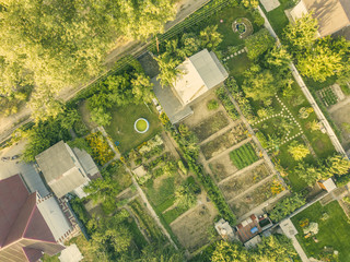 aerial drone shot of summer countryside cottage with garden f © Mihail