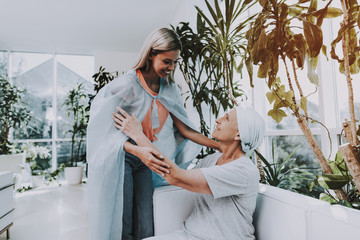 Cancer. Remission. Relationships. Woman with Mother.
