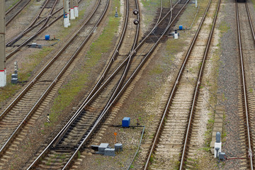 The railway junction on a cloudy day. Natural light. Landscape