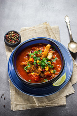 Chili soup in blue bowl.