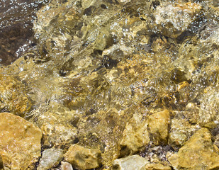 Stones under water. Background.