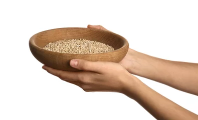  Poor woman holding bowl with grains on white background, closeup © New Africa