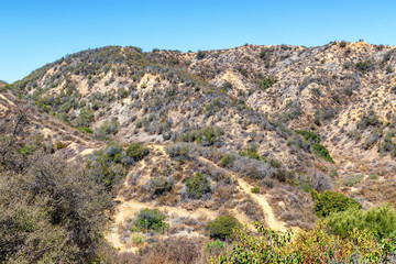 Fototapeta na wymiar Hiking trails up dry hillsides in southwest