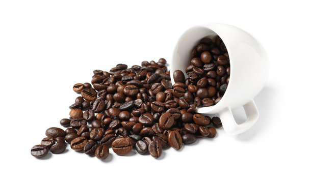 Cup and roasted coffee beans on white background