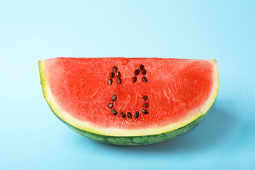 Watermelon with funny smiling face on color background