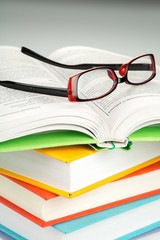 Glasses On Stack Of Books Close-up