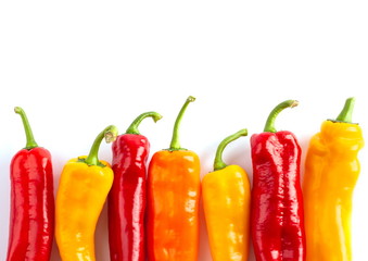 Colorful paprikas isolated on white