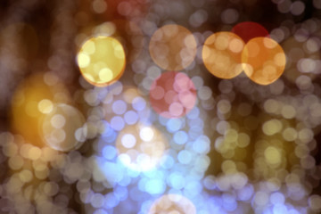 Blurry background image of defocused colorful lights at night