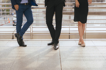 Cropped image of business team working and meeting while standing outdoor