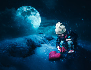 Photo Manipulation. Asian girl holding beautiful roses with red heart on ground.