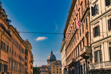 Obraz premium Roman street with dome of St. Paul's Basilica in background in Rome, Italy