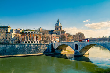 Fototapeta na wymiar Bridge Crossing into Tiber Island in Rome, Italy