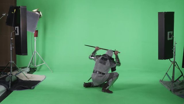 Medieval Templar Crusader Knight in Chainmail with Sword