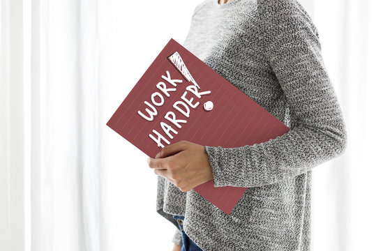 Work harder written on a paper