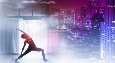 Fototapeta na wymiar Young woman practicing yoga in color background.Young people do yoga indoor for therapy her life style.Close up hands in meditating gesture. back to nature concept