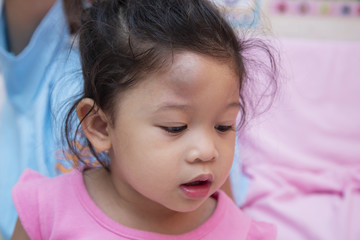 Asian little girl gets an accident on her head, Bump on the head.