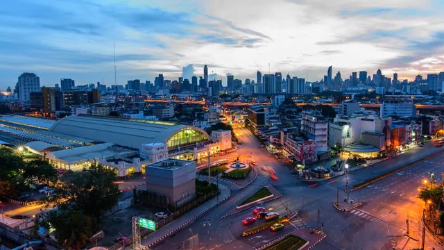 Time lapse High view of city with traffic car in sunrise time / Good morning Bangkok