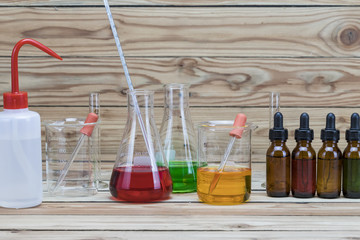 Beaker and bottle. Several chemical solution in flask. Laboratory glassware
