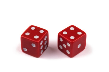 Two red dice closeup, isolated on white background, four and four