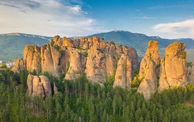 Amazing Belogradchik rock formation - natural phenomenon under the golden light of the setting sun - aerial shots of this popular tourist attraction on the Balkans