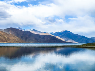 Pangong Lake or Pangong Tso with mountains reflection, Ladakh, India.