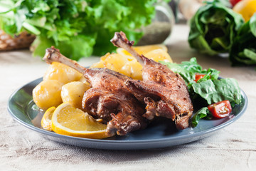 Duck legs confit with boiled potatoes