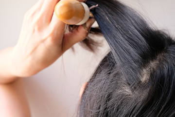 Obraz premium hair fall and lost alopecia woman problem on the comb.