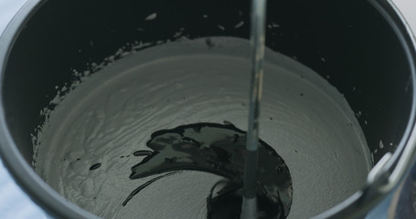 adding black ink to micro concrete plaster